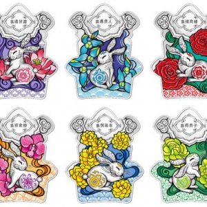 花团锦“兔”喜迎春——2023中国癸卯（兔）年喜字形金银纪念章欢喜上市